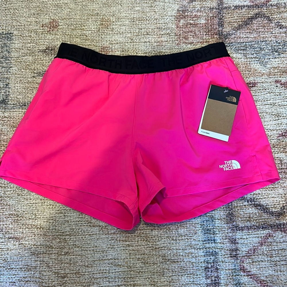 Women’s hot pink north face shorts